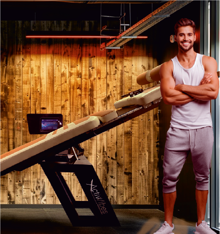 Man standing next to inversion table